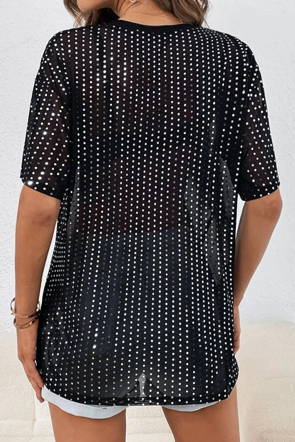 Polka Dot Round Neck Half Sleeve T-Shirt featuring a sheer rhinestone pattern and relaxed fit from the back view.