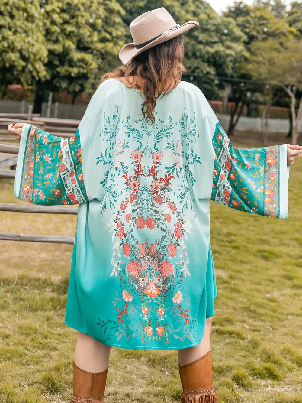 Plus Size Printed Open Front Long Sleeve Cover Up featuring a vibrant floral print and open front design.