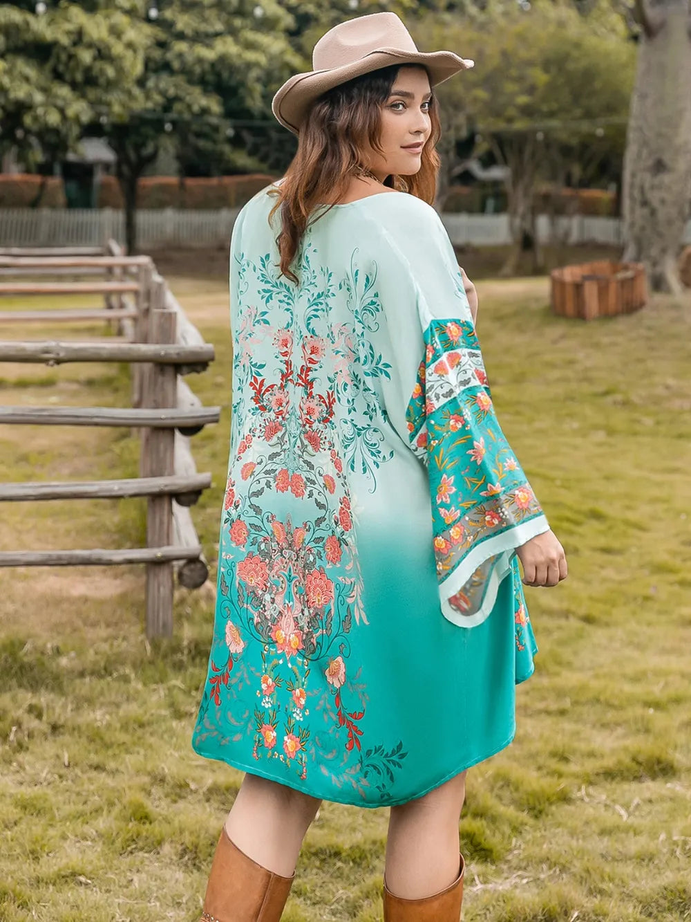Plus Size Printed Open Front Long Sleeve Cover Up in turquoise with floral design, perfect for layering over swimwear.