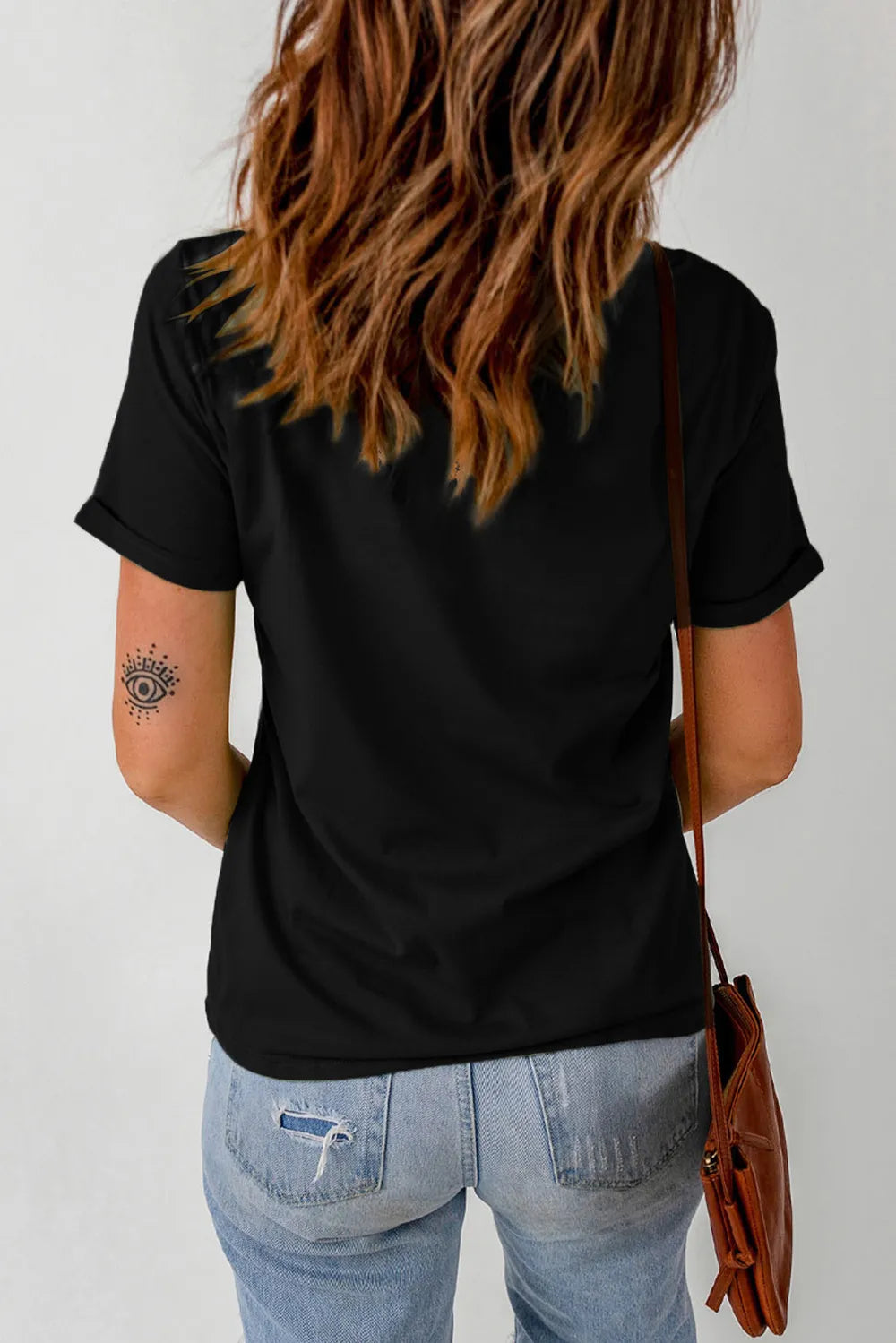 Rhinestone Round Neck Short Sleeve T-Shirt worn by a woman from the back, showcasing short sleeves and casual style.