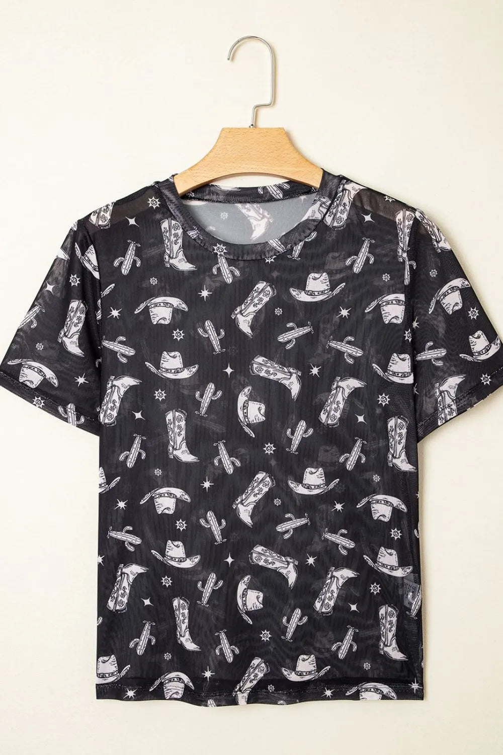 Western Pattern Mesh Sheer Crew Neck Top displayed on a hanger with a stylish Western print design.