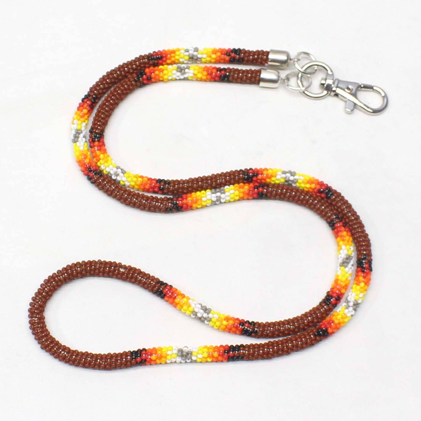 Handmade beaded Brown woven Southwestern lanyard featuring Czech glass beads in vibrant colors.