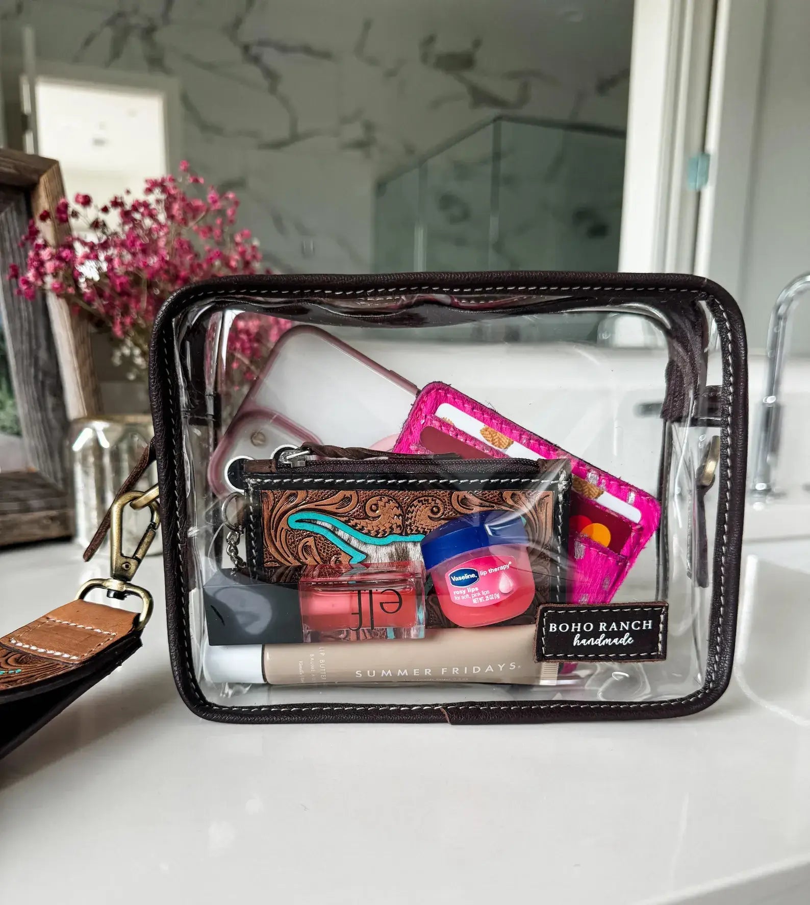 Darla clear wristlet | transparent western purse - game day holding phone, makeup, and essentials in clear design.