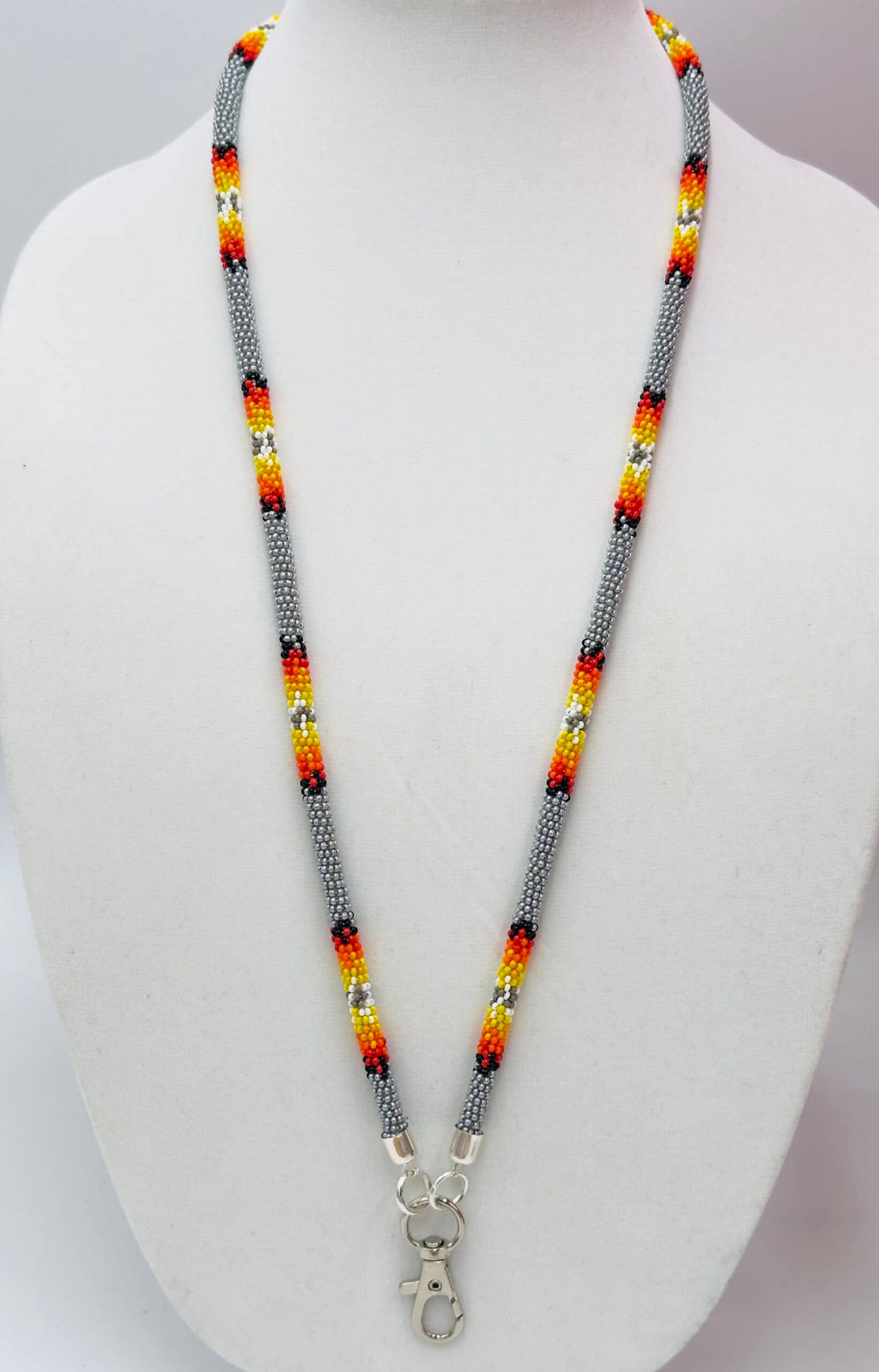Handmade beaded Grey rope style lanyard featuring Czech glass beads in grey, red, orange, yellow, black, and white.