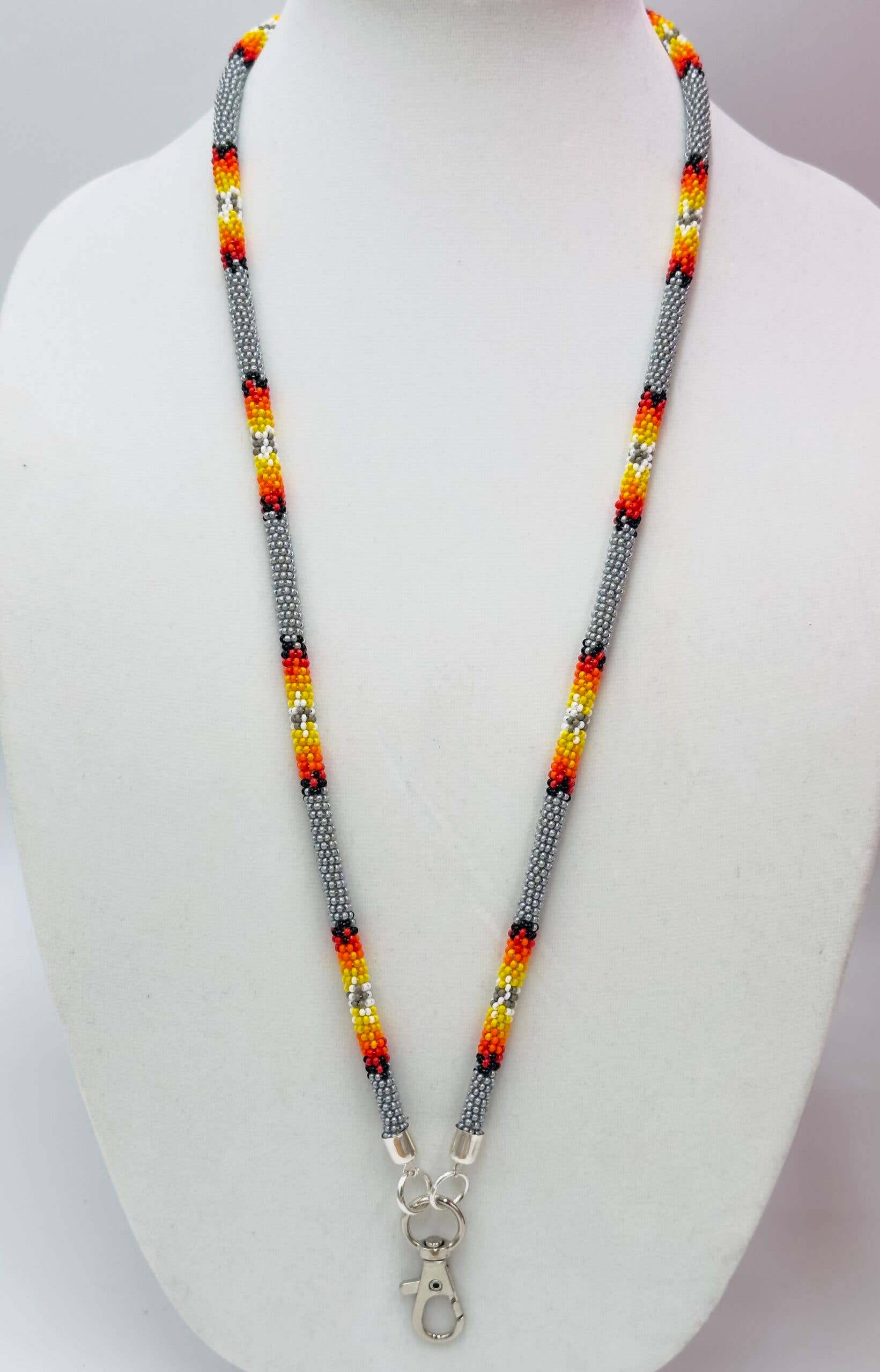 Handmade beaded Grey rope style lanyard featuring Czech glass beads in grey, red, orange, yellow, black, and white.