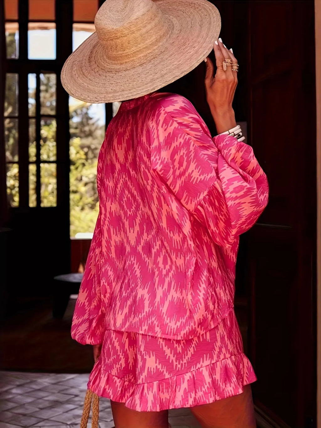 Printed Balloon Sleeve Top and Shorts Set shown in pink print with balloon sleeves and ruffled shorts, perfect for casual outings.