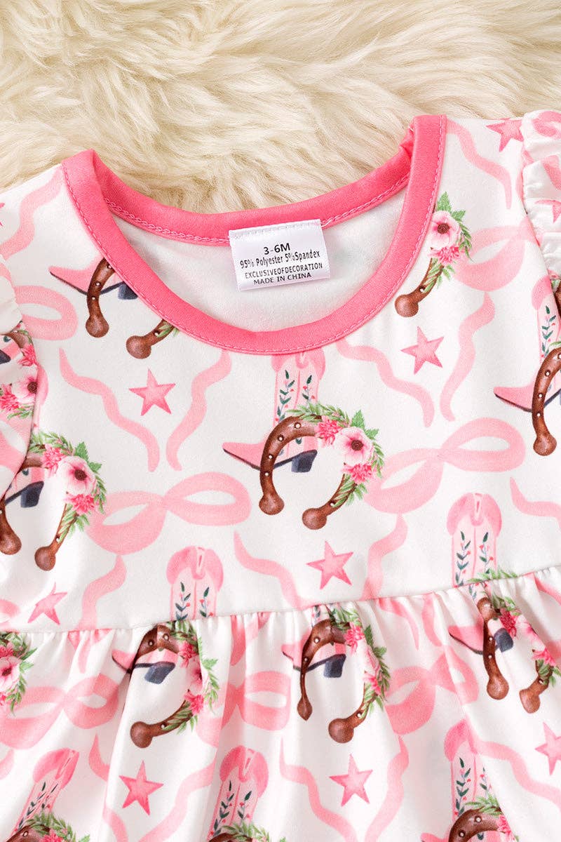 Horseshoe printed baby bodysuit dress with fuchsia ruffle hem.