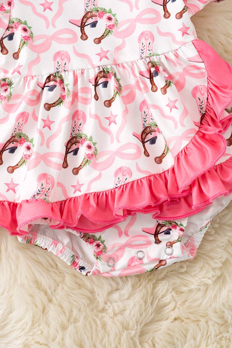 Horseshoe printed baby bodysuit dress with fuchsia ruffle hem.