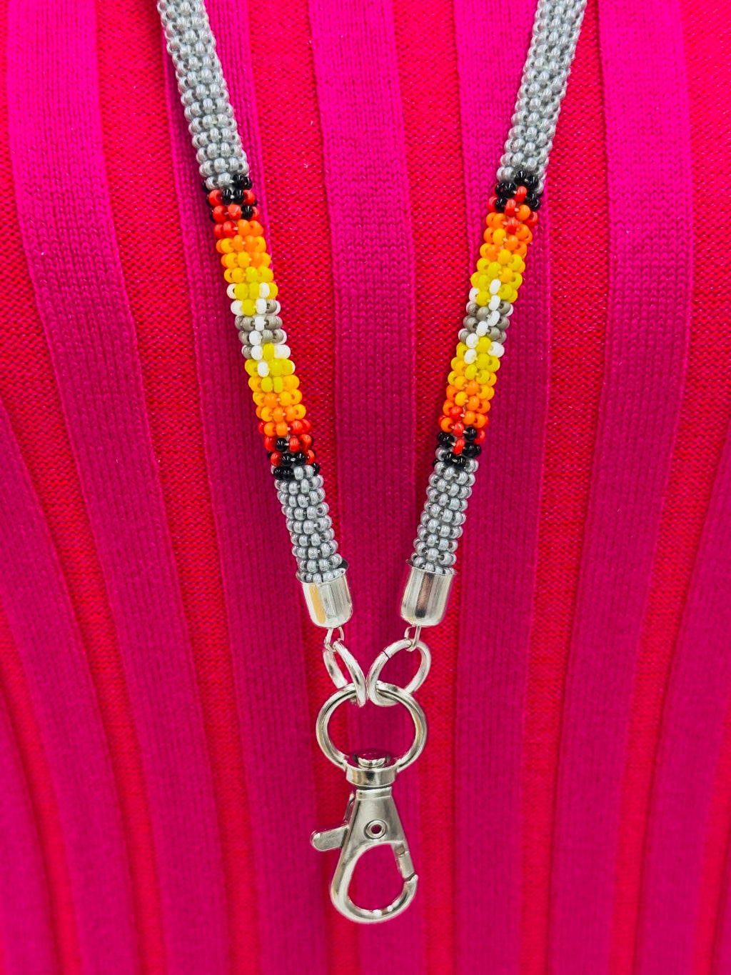 Handmade beaded Grey rope style lanyard featuring Czech glass beads in vibrant colors and a durable clasp.
