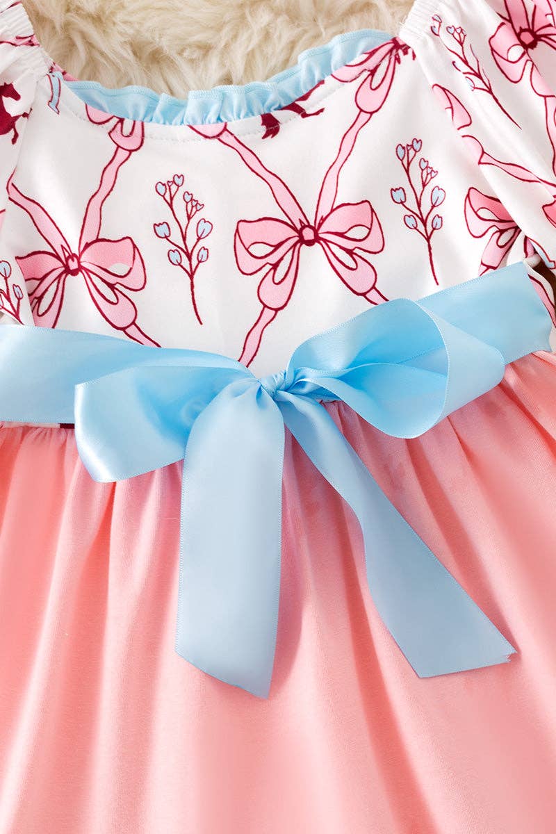 Pink Coquette western ruffle dress with blue front bow.