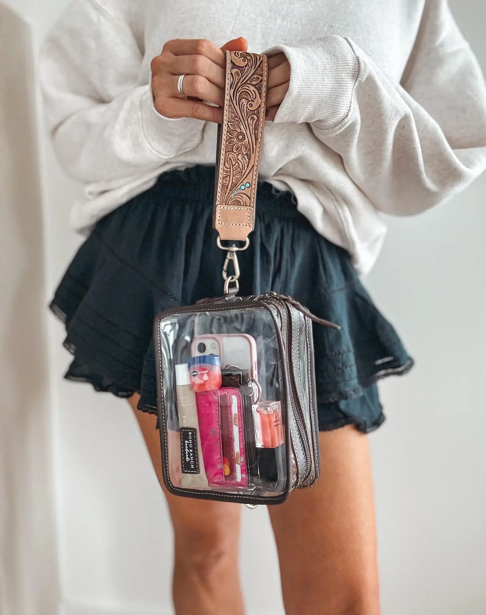 DARLA CLEAR WRISTLET | transparent western purse - game day with phone, lipstick, and keys inside the stylish clear design.