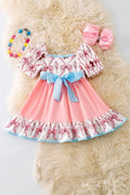 Pink Coquette western ruffle dress with blue front bow.