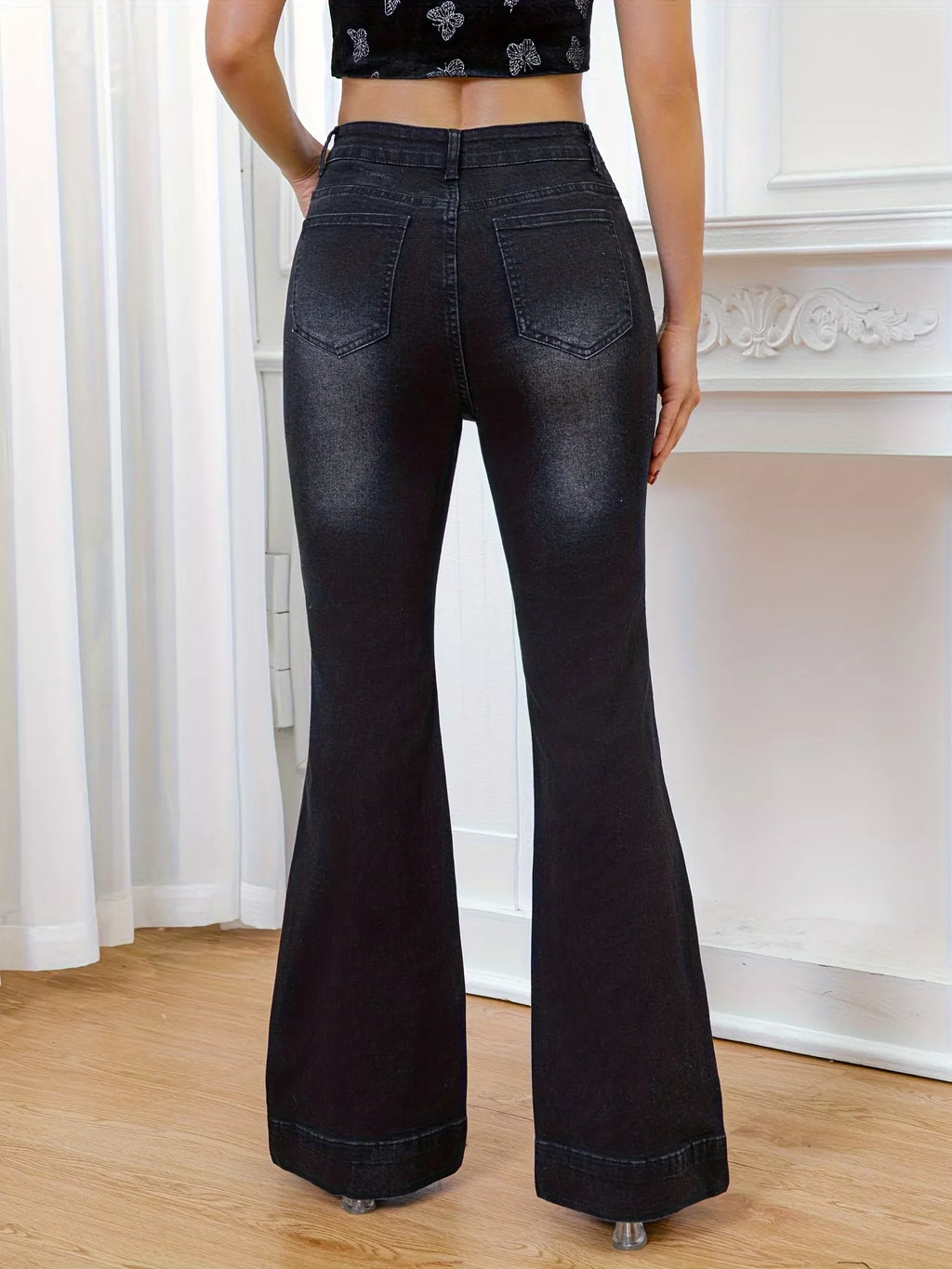 Rhinestone Embellished Flare Leg Jeans showcasing a flattering high-rise fit and classic flare cut, viewed from the back.